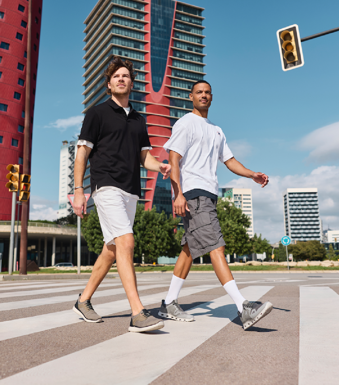 Men crossing the street in summer shoes