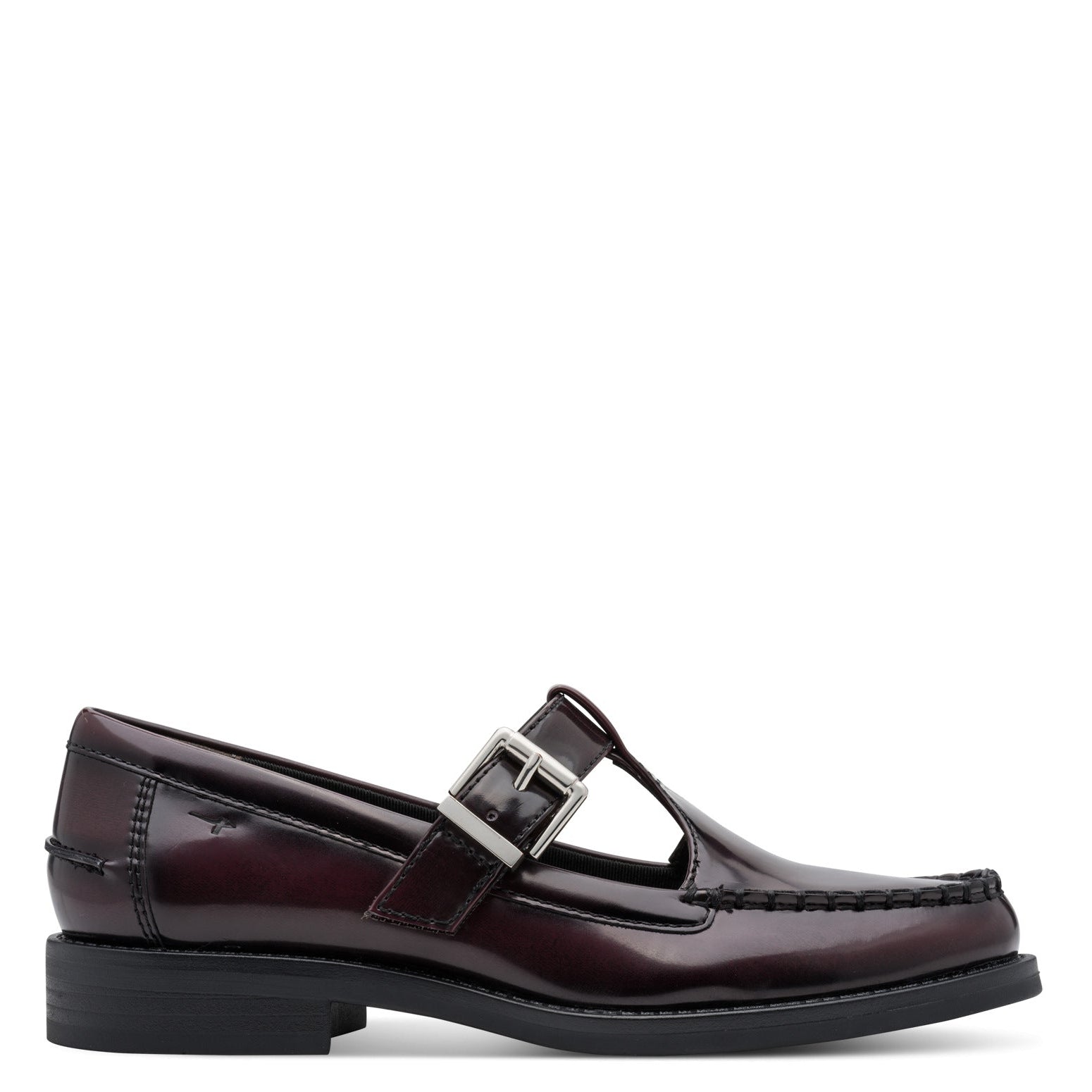 A single dark burgundy patent leather T-strap loafer with a silver buckle, shown in a side profile on a white background.