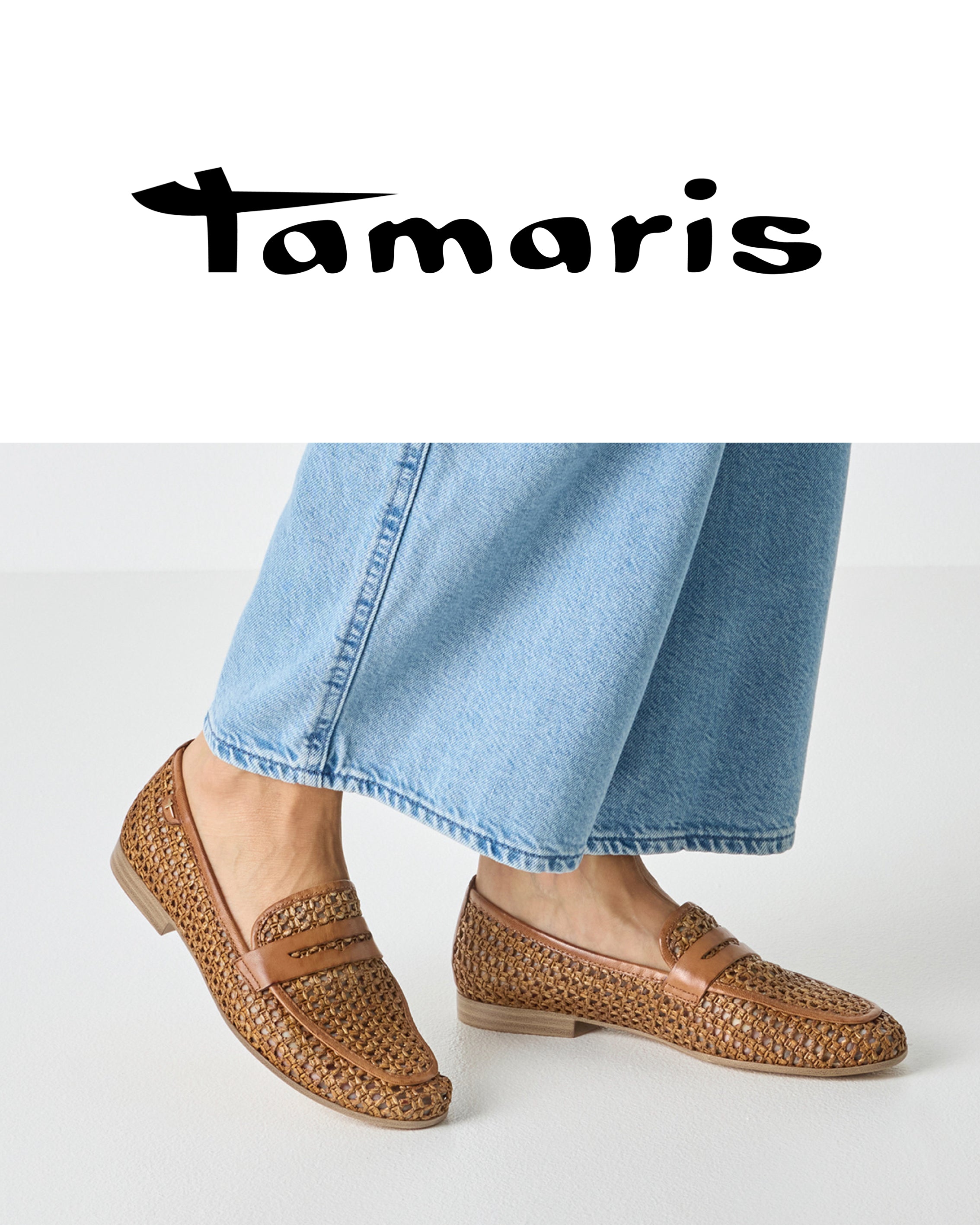 Brown woven shoes worn with light blue jeans on a white background, featuring the Tamaris brand.